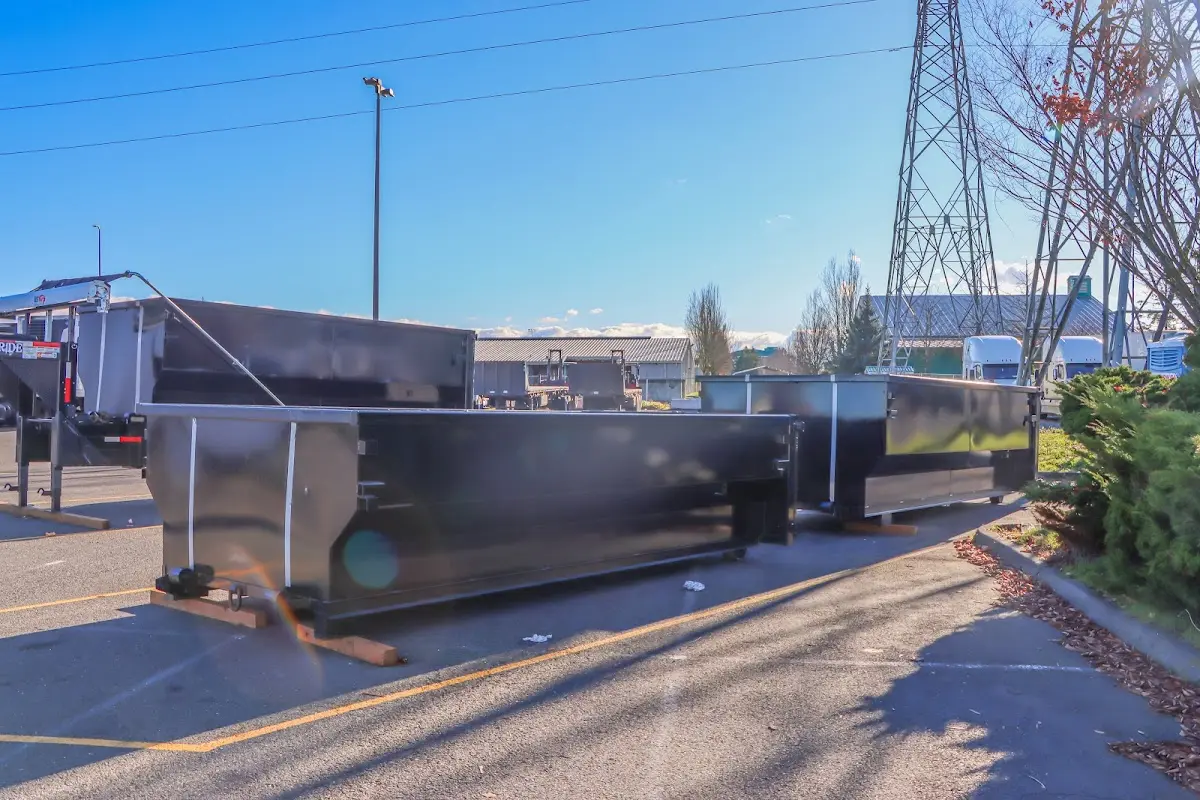 Roll-off dumpster ready for waste disposal at job site for Demolition Dumpster Rental in Ferguson